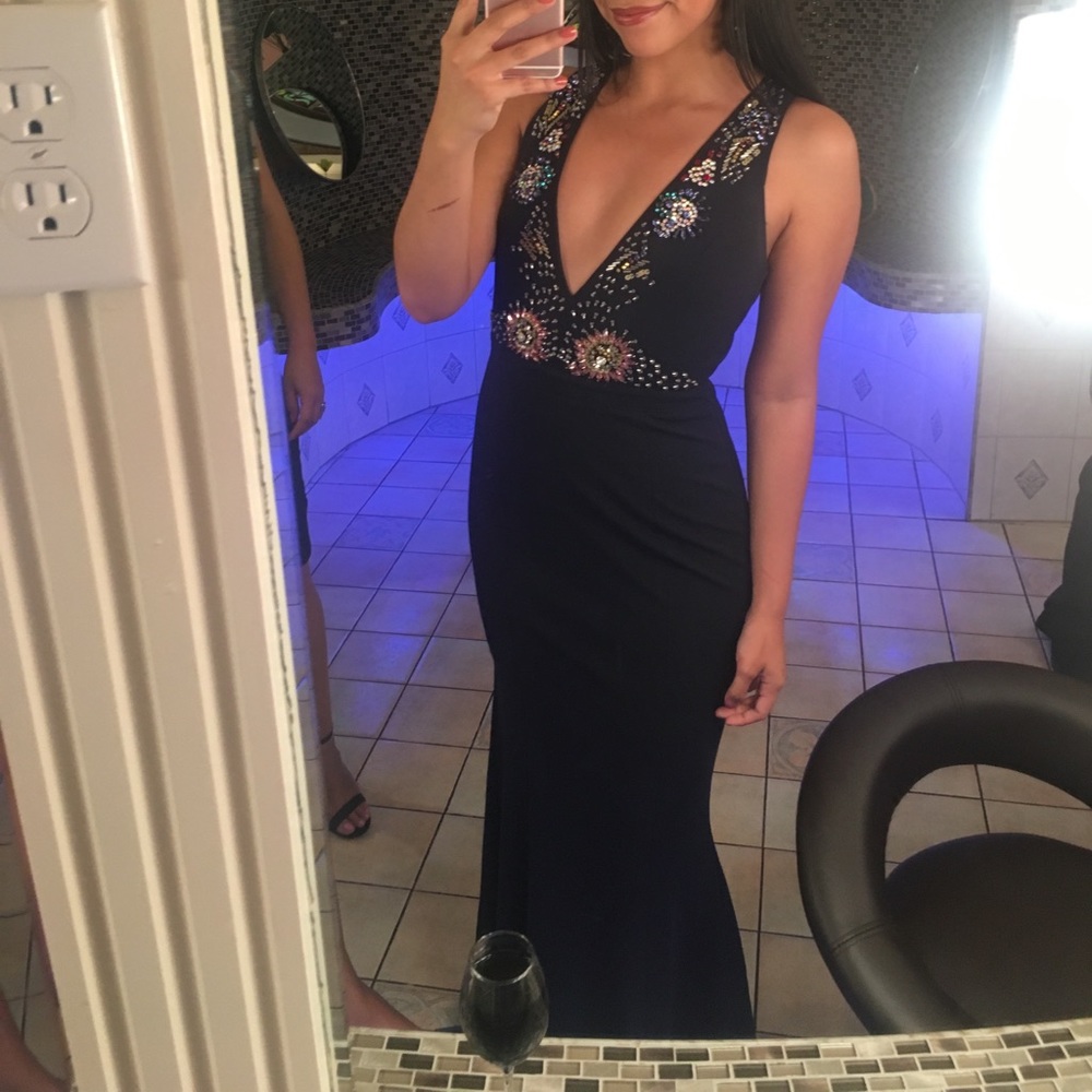 Dark elegant navy blue dress with deep v neck